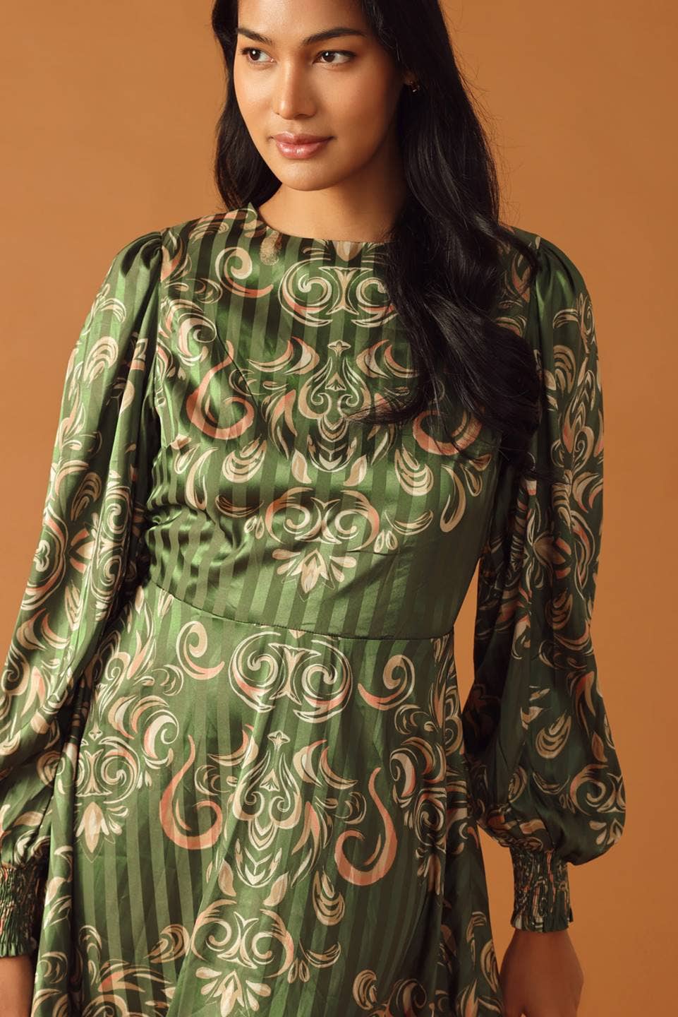 An Olive Green Midi Dress with Gold Scroll Designs