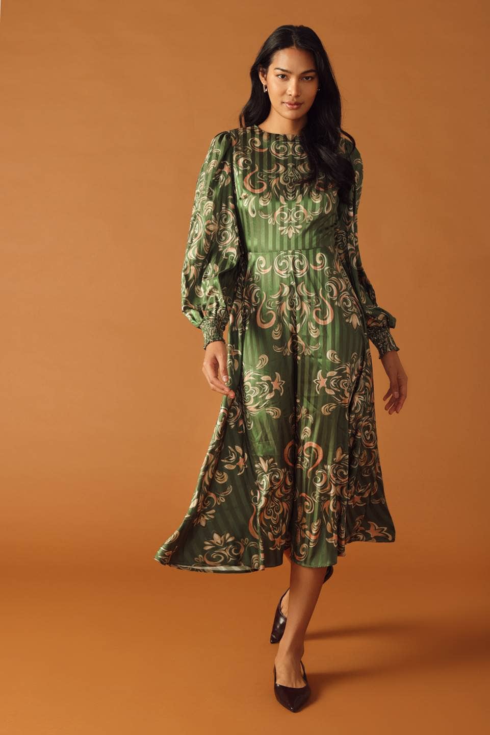 An Olive Green Midi Dress with Gold Scroll Designs