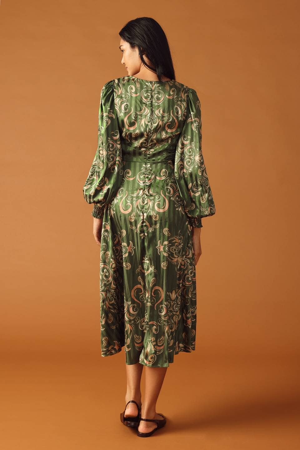 An Olive Green Midi Dress with Gold Scroll Designs